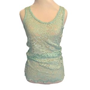 Buckle boutique sheer top